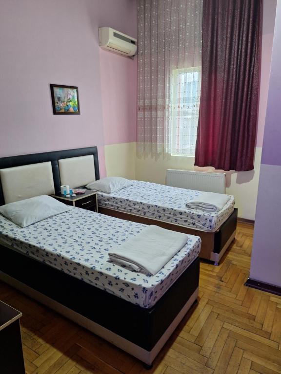 Postel nebo postele na pokoji v ubytování Gold Hotel Batum