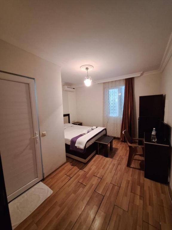Postel nebo postele na pokoji v ubytování Gold Hotel Batum