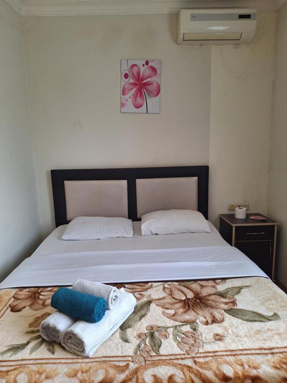 Postel nebo postele na pokoji v ubytování Gold Hotel Batum