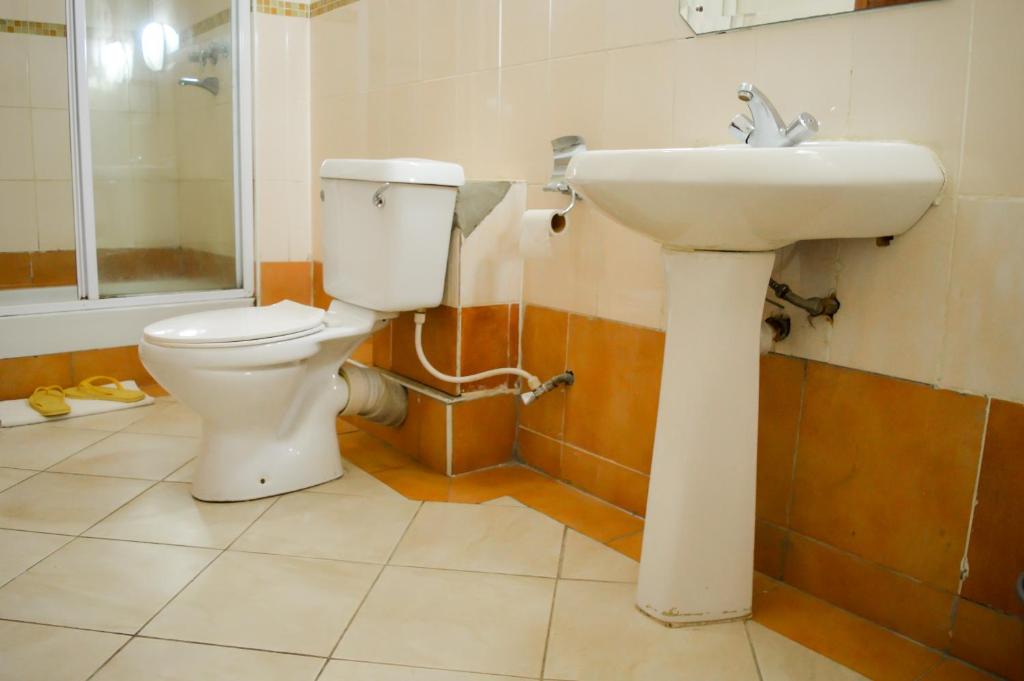 Koupelna v ubytování Anthena Hotel