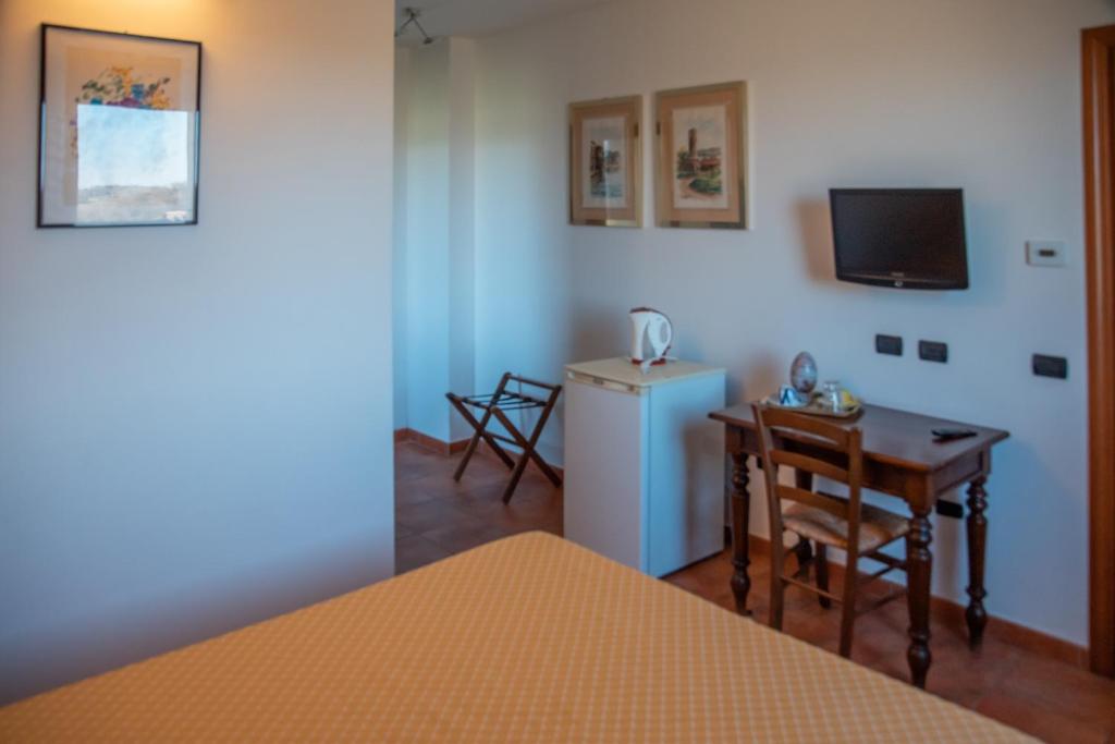 TV a/nebo společenská místnost v ubytování Bio Agriturismo Vojon