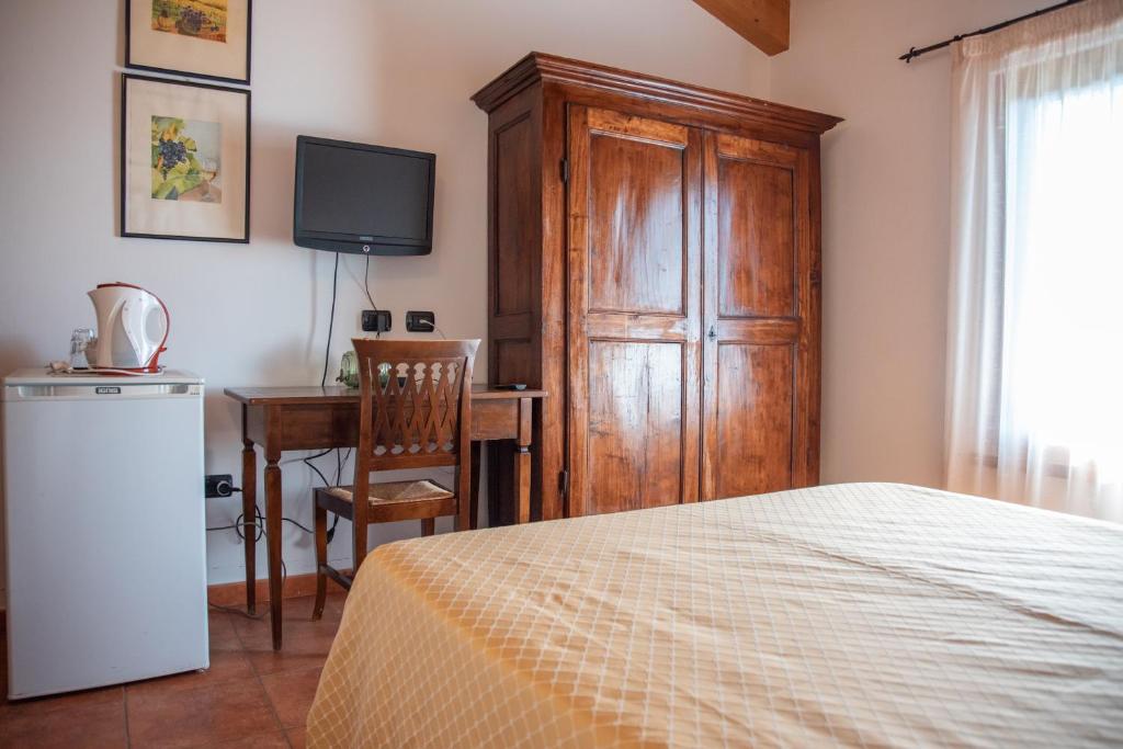 Postel nebo postele na pokoji v ubytování Bio Agriturismo Vojon