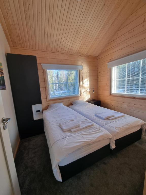 Postel nebo postele na pokoji v ubytování Arctic Home Experience