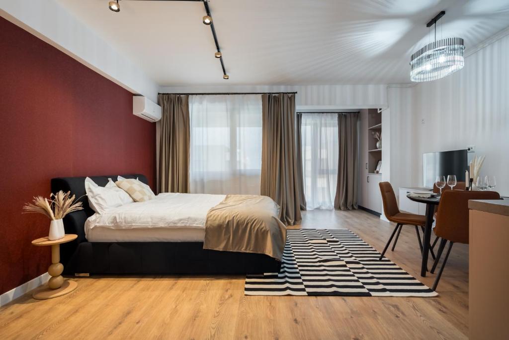 En eller flere senge i et værelse på Ivory Concept Studio 53