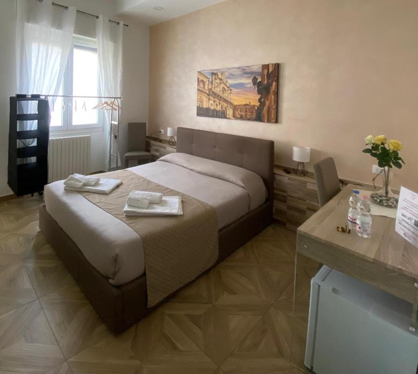 Postel nebo postele na pokoji v ubytování LECCE MON AMOUR B&B