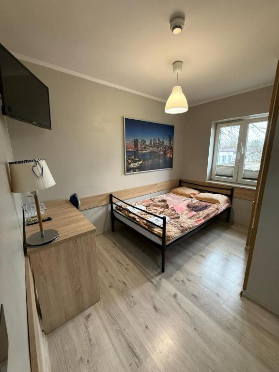Postel nebo postele na pokoji v ubytování Hostel CENTRUM