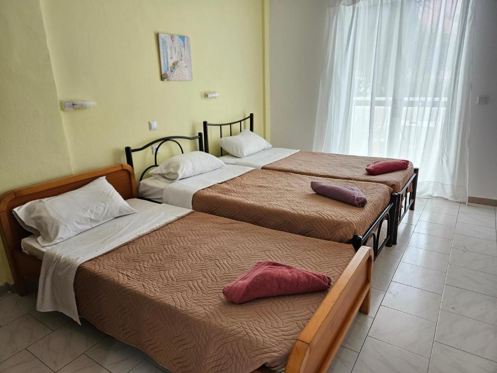 A bed or beds in a room at VILLA ELENA