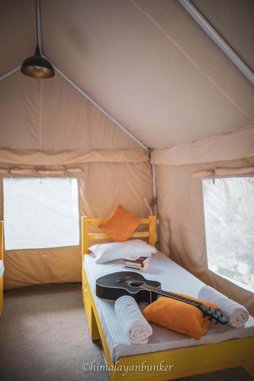 Postel nebo postele na pokoji v ubytování Himalayan Bunker Nubra II