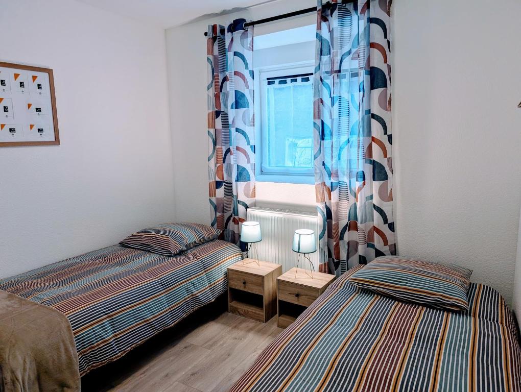 Postel nebo postele na pokoji v ubytování Gite Des Chevaliers