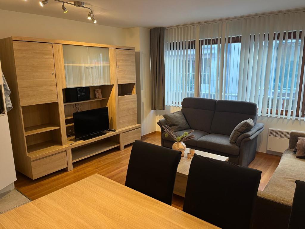 Posezení v ubytování Prachtig appartement in het toeristische centrum voor max 6 pers gratis 2 fietsen ter beschikking