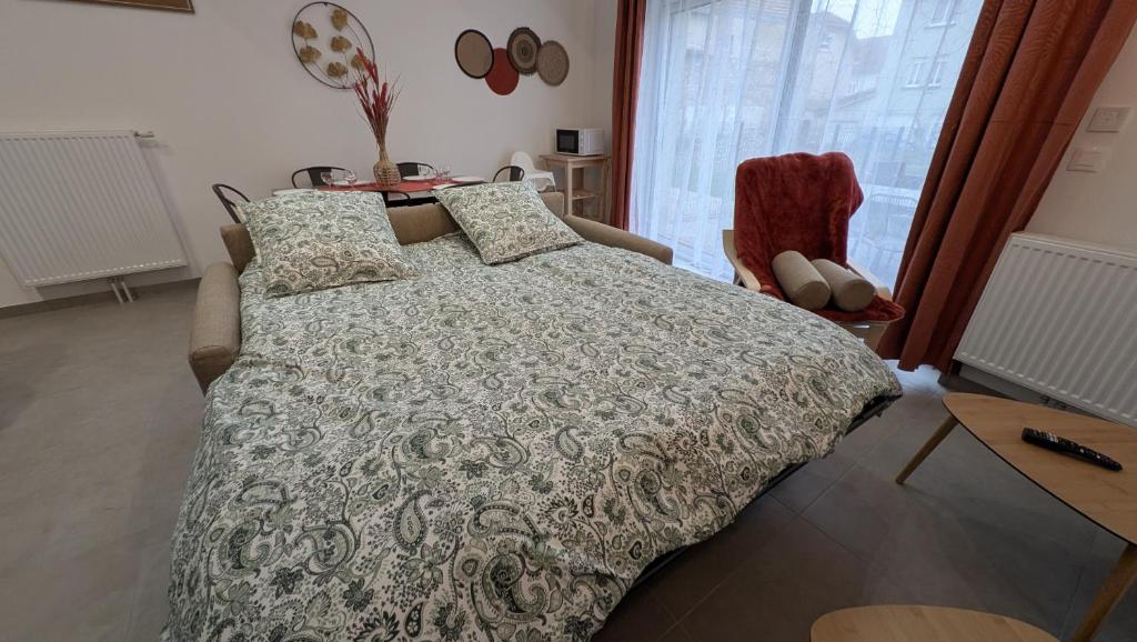 Postel nebo postele na pokoji v ubytování Gite Des Chevaliers