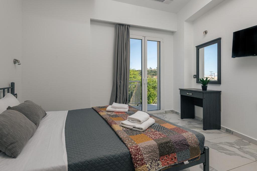 TV/Unterhaltungsangebot in der Unterkunft Katsaros Luxury Apts 5 min walk to beach
