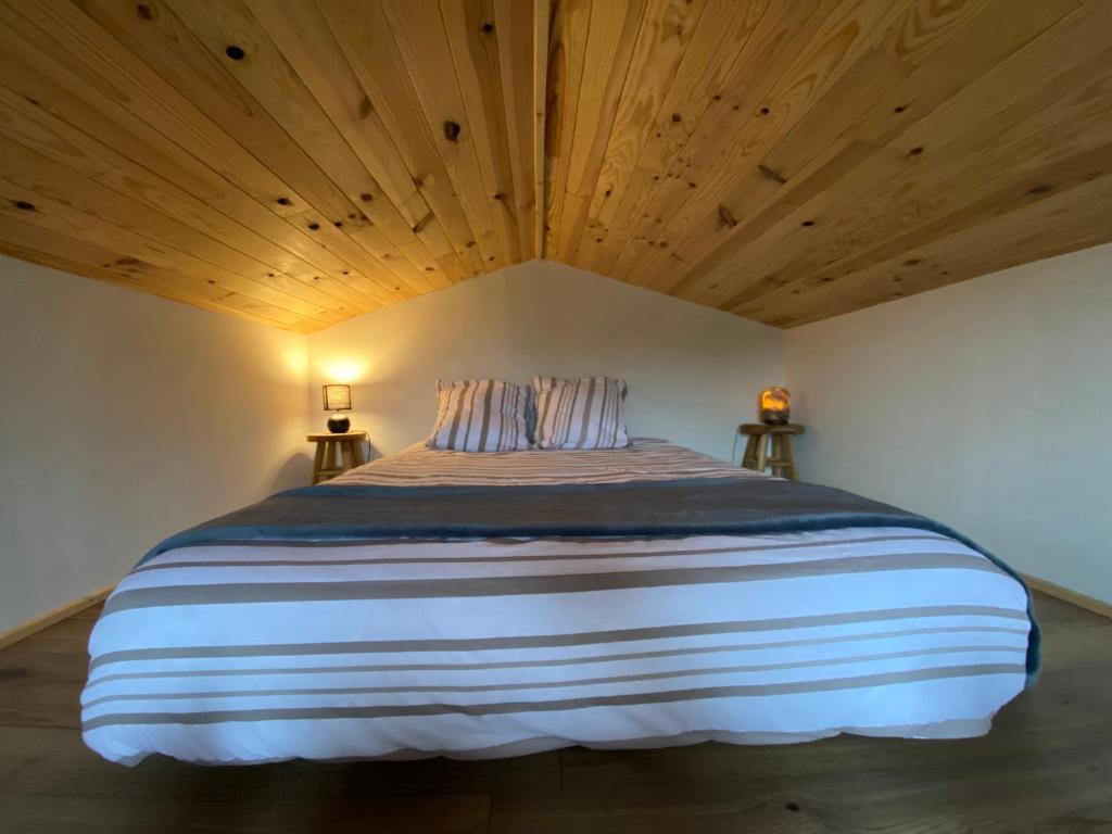 Postel nebo postele na pokoji v ubytování Chalet de l'Abondance
