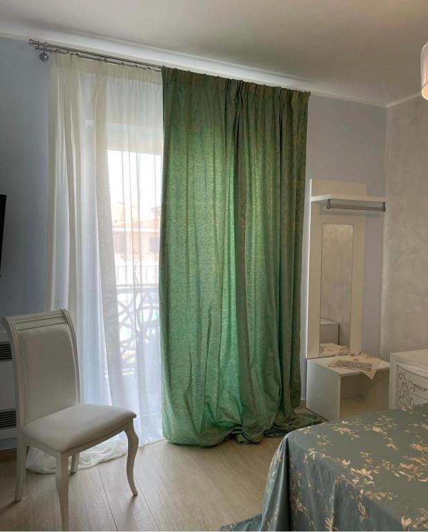 Postel nebo postele na pokoji v ubytování Albamaris Guest House