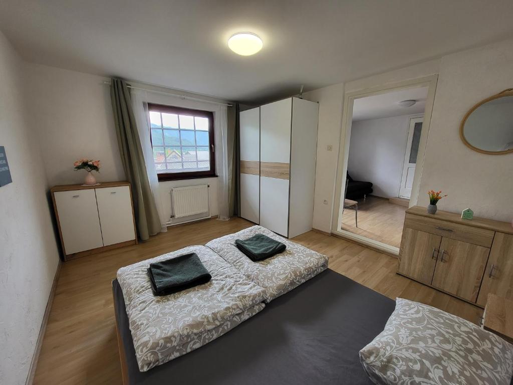 Ένα ή περισσότερα κρεβάτια σε δωμάτιο στο Mountain Rock Apartment