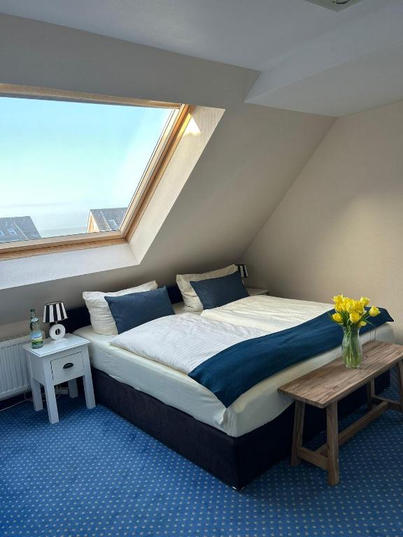 Postel nebo postele na pokoji v ubytování Hotel Hansa