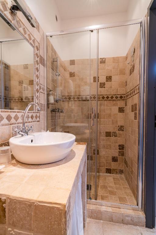 Koupelna v ubytování Hôtel l'Orangeraie