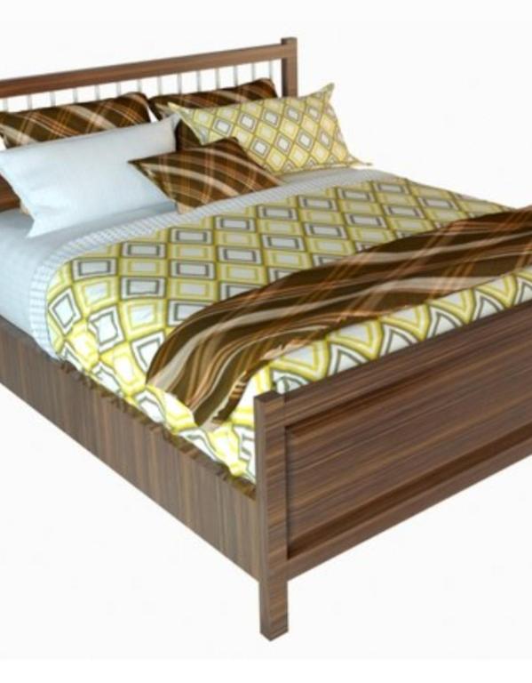 a bed with a wooden frame and pillows on it at Habitacion E in Zaragoza