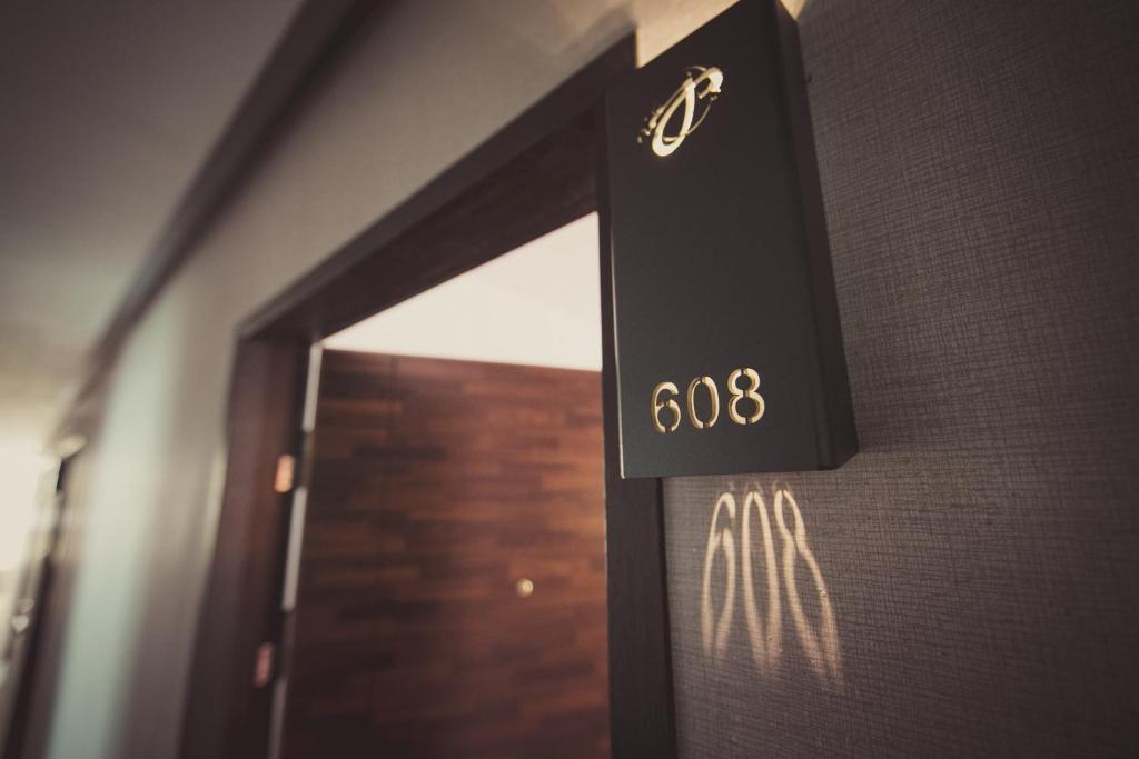 Certifikát, hodnocení, plakát nebo jiný dokument vystavený v ubytování Jin Pin Hotel