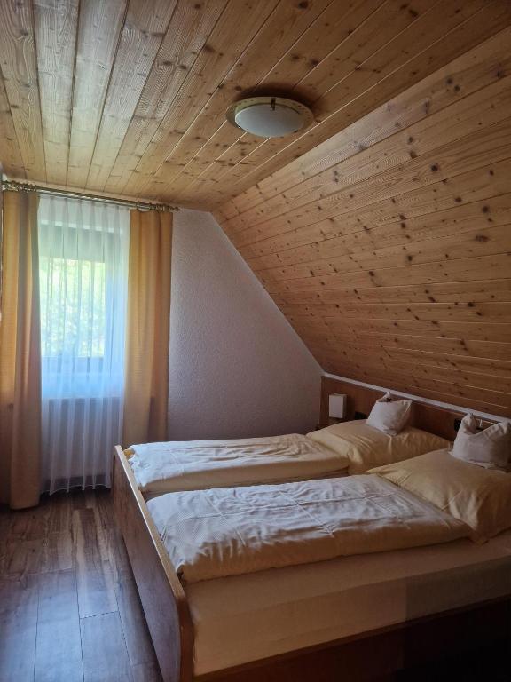 Postel nebo postele na pokoji v ubytování Haus Bachmatt