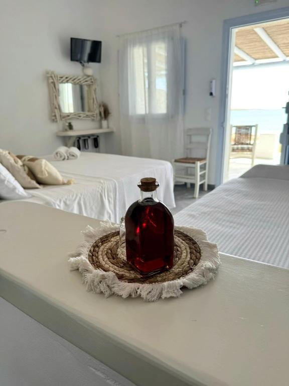 Łóżko lub łóżka w pokoju w obiekcie Palio Karnagio Παλιό Καρνάγιο