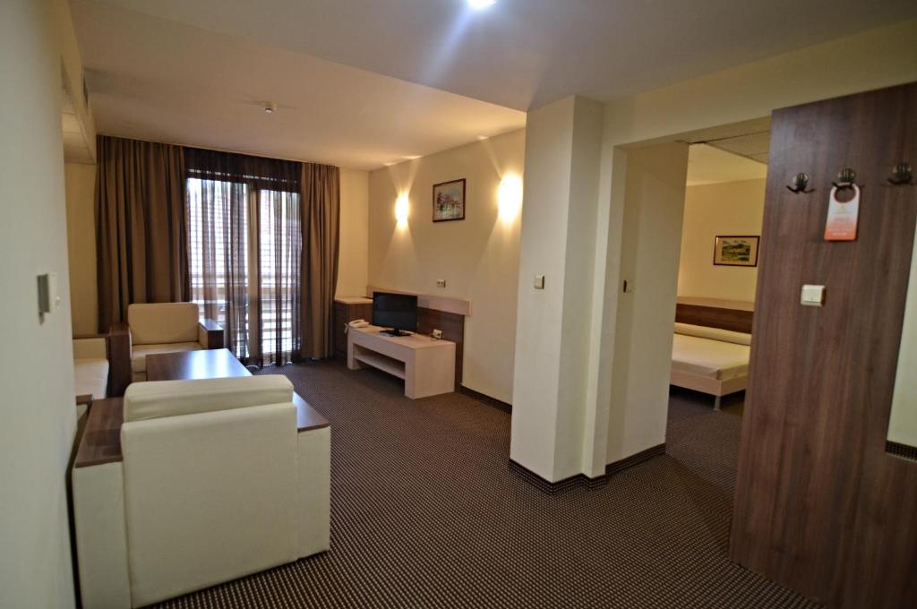 Postel nebo postele na pokoji v ubytování Spa Hotel Kleptuza