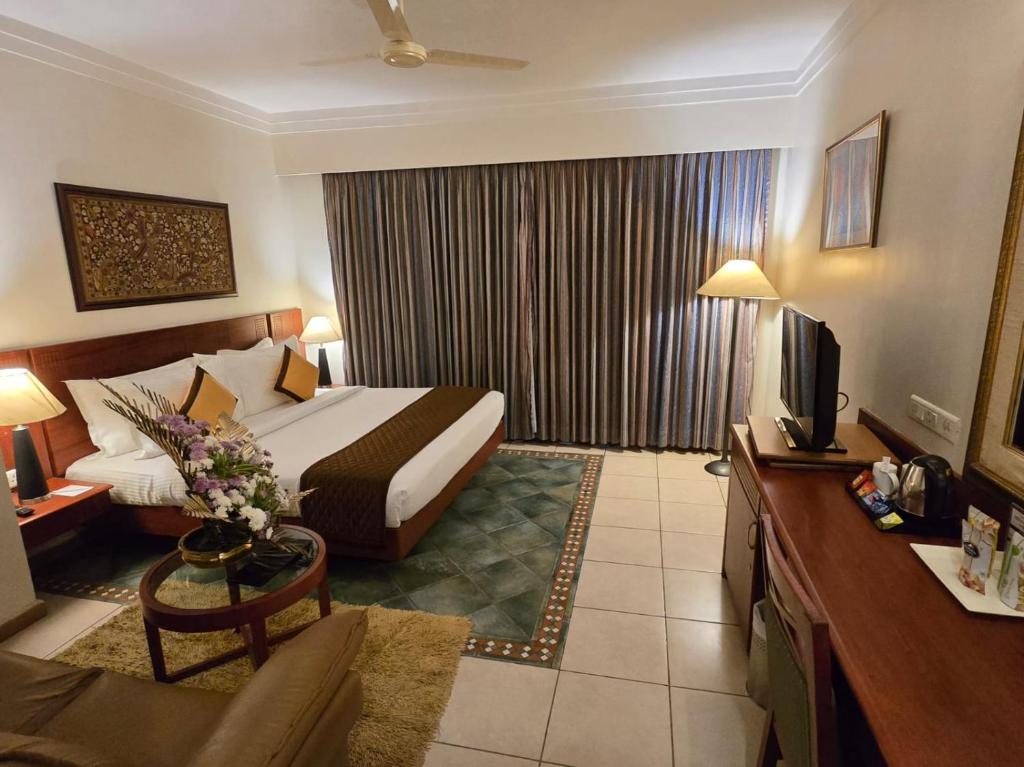 Postel nebo postele na pokoji v ubytování Harrisons Hotel