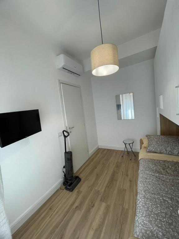 TV a/nebo společenská místnost v ubytování La Casa di Ary