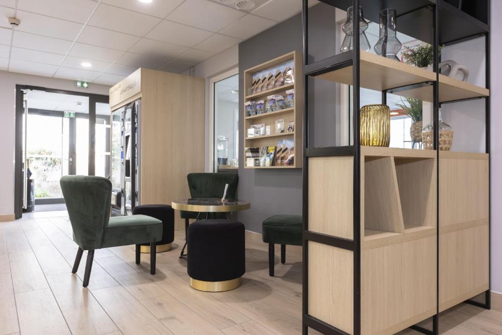Posezení v ubytování Appart Hotel Odalys City Colmar La Rose d'Argent