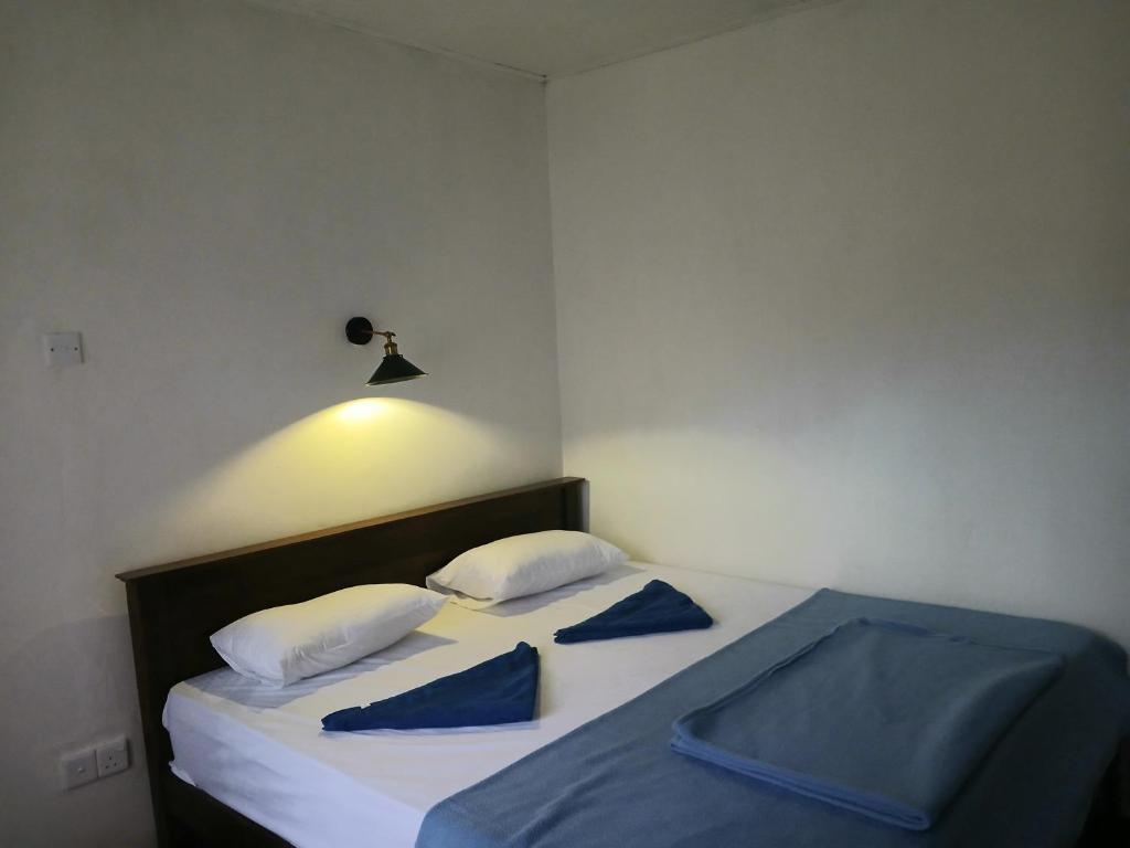 Postel nebo postele na pokoji v ubytování Ella Mount Villa