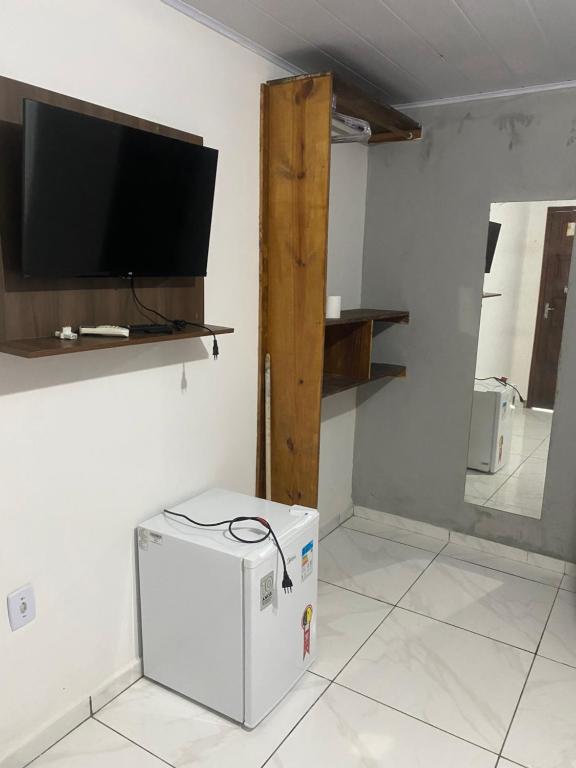 TV a/nebo společenská místnost v ubytování Pousada Aconchego Diamantina