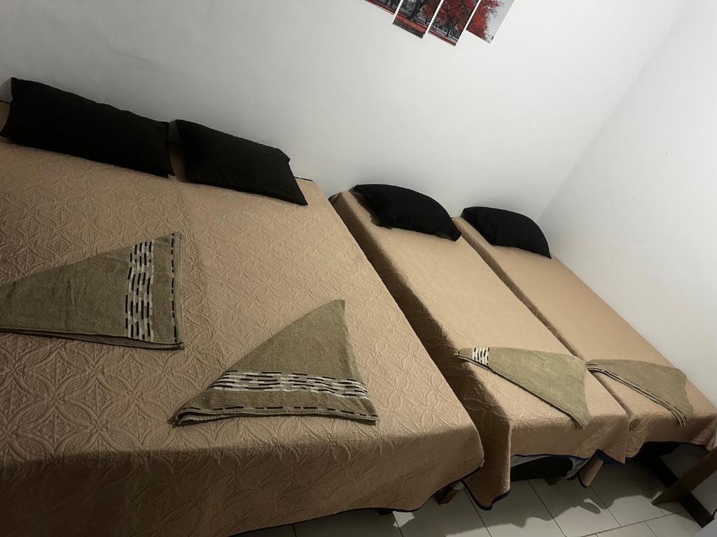 Postel nebo postele na pokoji v ubytování Pousada Aconchego Diamantina