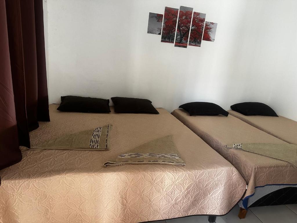 Postel nebo postele na pokoji v ubytování Pousada Aconchego Diamantina