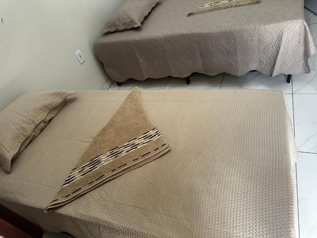 Postel nebo postele na pokoji v ubytování Pousada Aconchego Diamantina