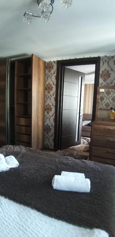 Postel nebo postele na pokoji v ubytování Guest House Misho