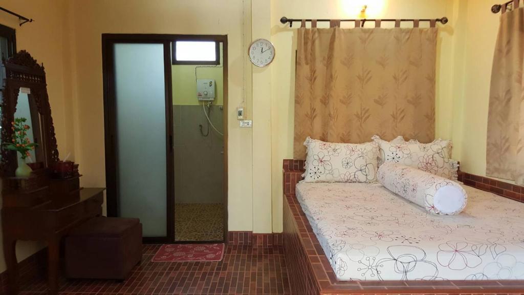 Postel nebo postele na pokoji v ubytování At Sichon Resort