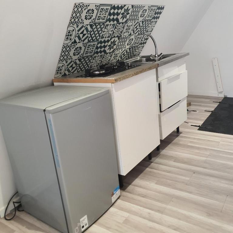 Kuchyň nebo kuchyňský kout v ubytování Studio atypique avec superbe vue