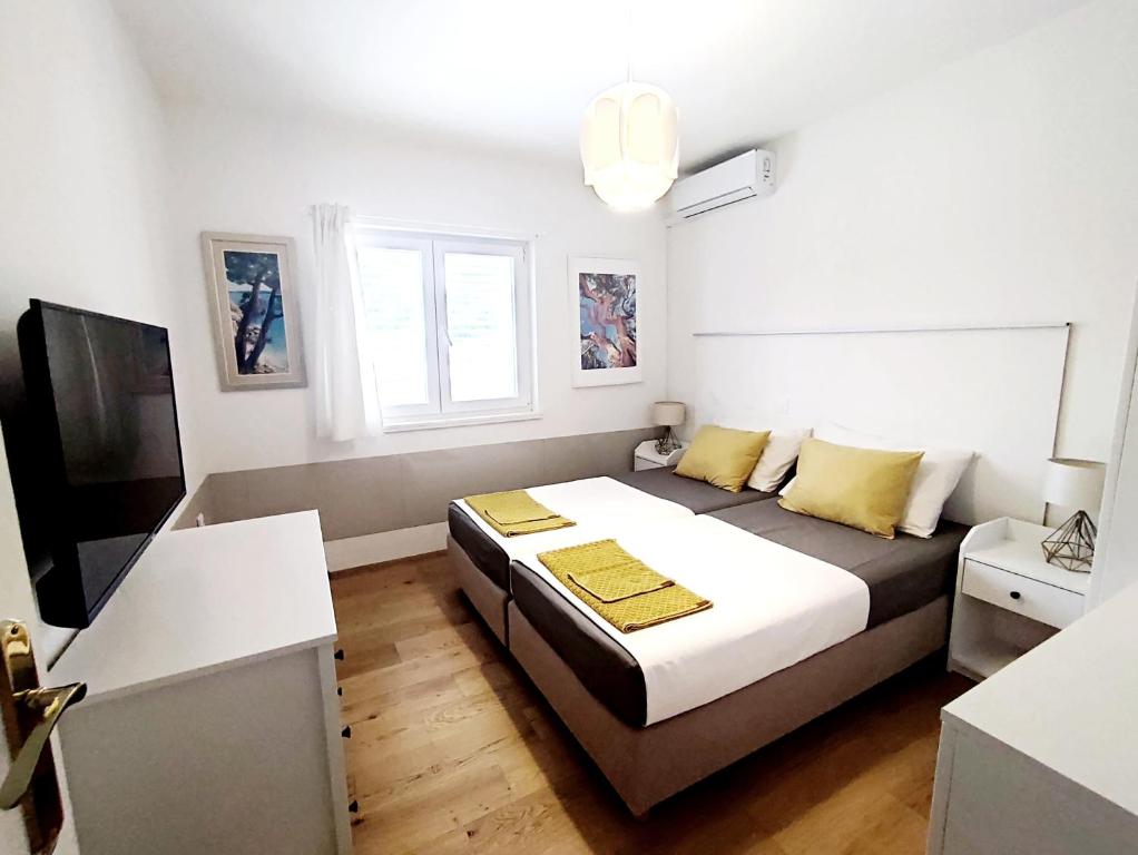 Posteľ alebo postele v izbe v ubytovaní Apartment ROSE, CLOSE TO THE BEACH