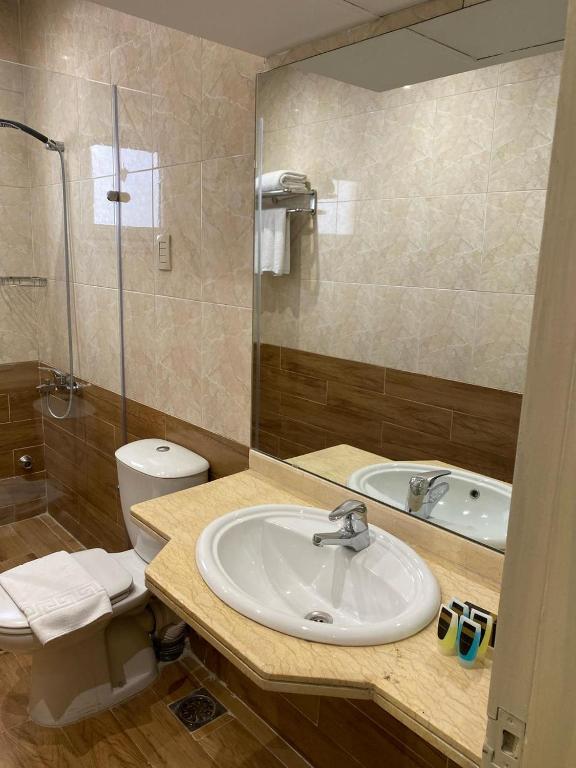 Koupelna v ubytování Golden Carven Hotel