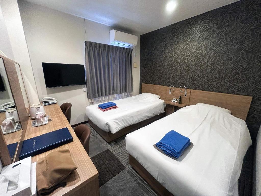 Телевизор и/или развлекательный центр в Business Hotel Goi Onsen - Vacation STAY 78238v