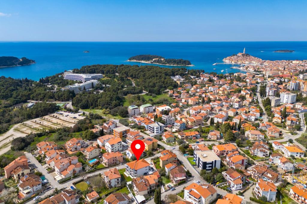 an aerial view of a city with a red marker at Adults only Guesthouse Villa Samantha by Irundo in Rovinj