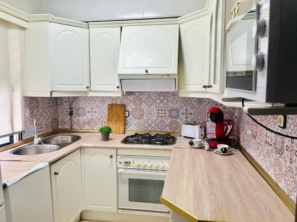 Kuchyň nebo kuchyňský kout v ubytování Apartamento La Iglesia