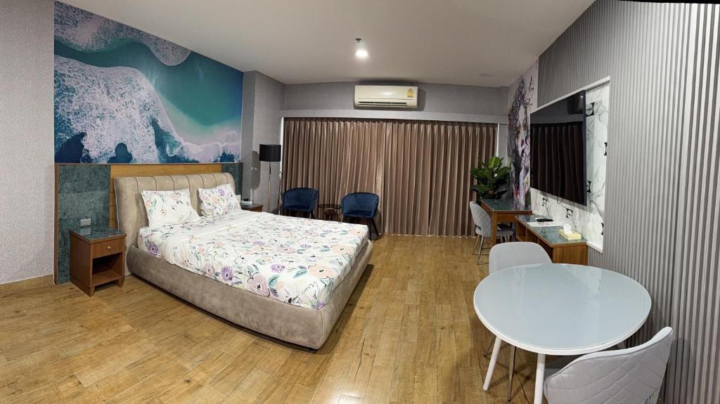 Postel nebo postele na pokoji v ubytování Pattaya Beach View Talay 6 by AEGEAN Suite Condo