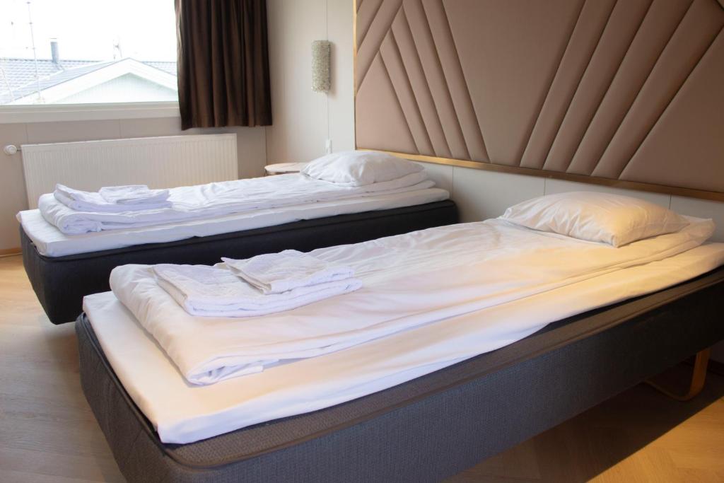 Postel nebo postele na pokoji v ubytování A Hotels Roskilde