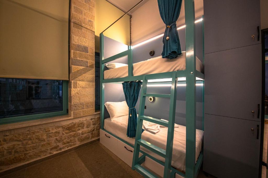 Postel nebo postele na pokoji v ubytování Vega 43 Hostel