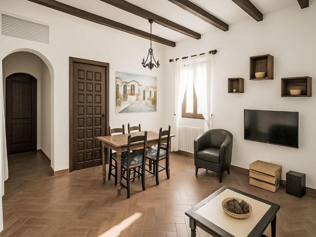 Televízia a/alebo spoločenská miestnosť v ubytovaní Holiday Home Toscamolino by Interhome