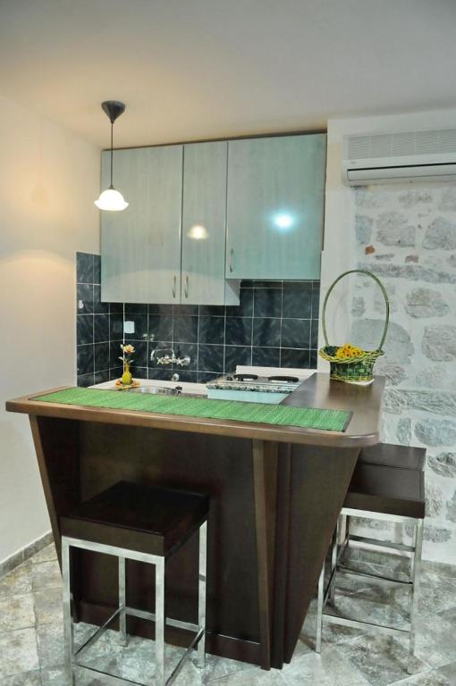 Kuchyň nebo kuchyňský kout v ubytování Apartments Kotor Old Town