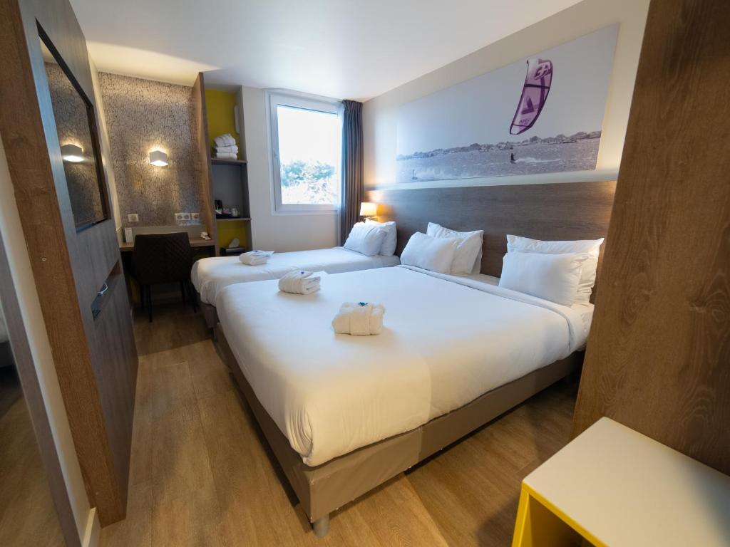 Postel nebo postele na pokoji v ubytování Best Western Hotelio Montpellier Sud