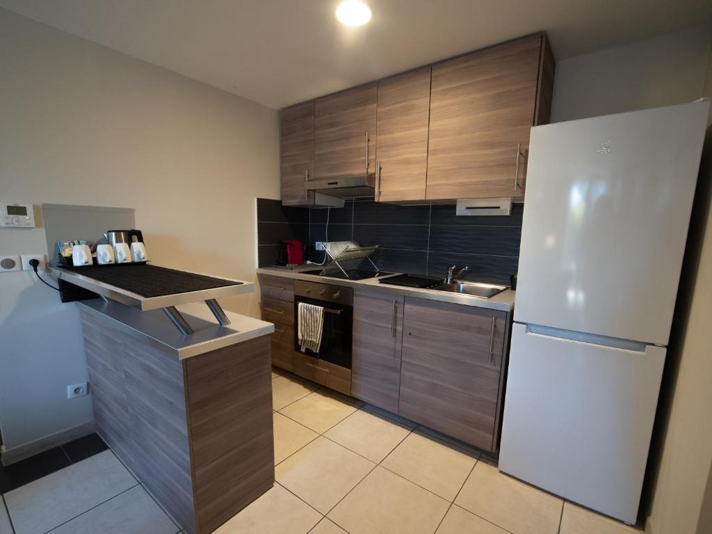 Kuchyň nebo kuchyňský kout v ubytování Best Western Hotelio Montpellier Sud