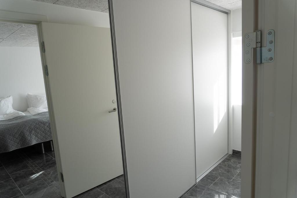 Postel nebo postele na pokoji v ubytování Birkelse Hotel og Kro